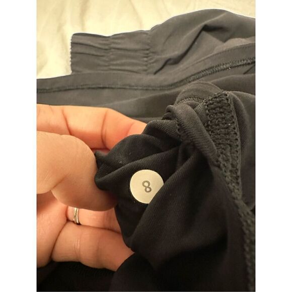 Lululemon Run Breeze size 8 black skirt. Shorts under with pockets. - Picture 9 of 9